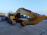 2020 Caterpillar 323-07 crawler excavator, rear three-quarter view