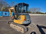 2010 Komatsu PC50MR-2 mini excavator, rear three-quarter view