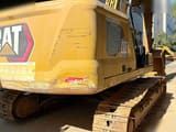 2022 Caterpillar 333 crawler excavator, rear three-quarter view