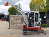 2012 Takeuchi TB219 mini excavator, side view