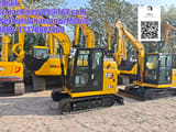 2026 Caterpillar 305.5 mini excavator, front three-quarter view
