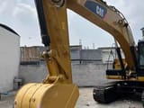 Escavatore cingolato Caterpillar 320D2 del 2022, vista di braccio e benna