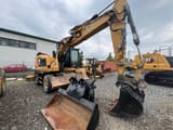 2018 Caterpillar M315F wheel excavator, front three-quarter view