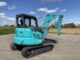 2024 Kobelco SK58SRX-7 mini excavator, rear three-quarter view