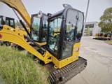 2026 Caterpillar 302CR mini excavator, side view of cab
