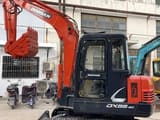 2023 Doosan DX55-9C mini excavator side view