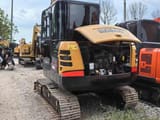 Sany SY60C mini excavator, rear three-quarter view with engine cover open