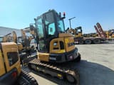 2026 XCMG XE55U mini excavator, rear three-quarter view