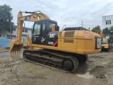 Caterpillar 329D crawler excavator, rear three-quarter view