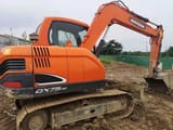 Doosan DX75-9C excavator side view