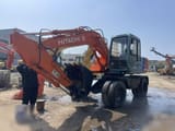 1993 Hitachi EX100W wheel excavator, side profile view