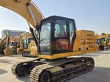 2023 Caterpillar 323GC crawler excavator, side view