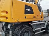 2023 Liebherr 920 Litronic wheeled excavator rear three-quarter view