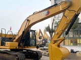 2022 Caterpillar 320GC crawler excavator side view