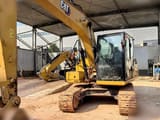 2024 Caterpillar 313GC crawler excavator, front three-quarter view