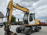 2010 Liebherr A314 wheel excavator, side profile view