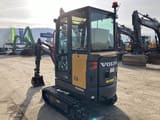 2022 Volvo EC18 Electric mini excavator, rear three-quarter view