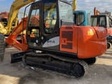 Hitachi Zaxis 60 mini excavator, side view