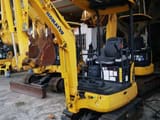 2022 Komatsu PC18MR mini excavator, front three-quarter view
