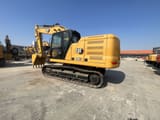 2024 Caterpillar 320GC crawler excavator, rear three-quarter view