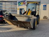 2011 JCB 409 wheel loader, front three-quarter view