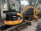 2016 Caterpillar 303CR mini excavator, rear three-quarter view