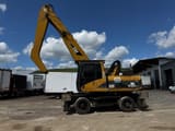 2005 Caterpillar M322C MH material handler, side profile view