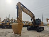 2024 Caterpillar 345GC crawler excavator, front three-quarter view