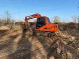 2023 Doosan DH80G mini excavator, side profile view
