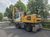 2015 Liebherr LH 24 material handler, rear three-quarter view