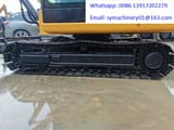 2023 Caterpillar 305.5E2 crawler excavator undercarriage side view