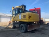 2012 Komatsu PW180-E0 wheel excavator, rear three-quarter view