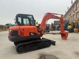 2018 Doosan DX60 crawler excavator, rear three-quarter view