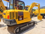2019 Komatsu PC58 mini excavator, rear three-quarter view