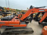 2021 Doosan DX300LC-9C crawler excavator, rear three-quarter view