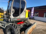 2016 Wacker Neuson EW100 wheel excavator side view
