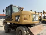 2018 Caterpillar M315D2 wheel excavator rear three-quarter view