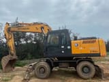 Hyundai Robex 210W-7 wheel excavator, side view