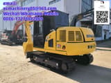 2023 Komatsu PC70-8 mini excavator, rear three-quarter view