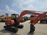 2021 Doosan DH55 mini excavator, side view