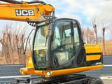 2011 JCB JS145W wheel excavator cab and boom view