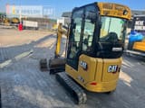 2022 Caterpillar 301.6-05A mini excavator, rear three-quarter view