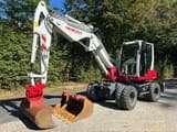 2015 Takeuchi TB295W wheel excavator side view