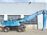 2015 Fuchs MHL340 E material handler, side view