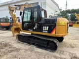 2016 Caterpillar 312D2 crawler excavator, rear three-quarter view