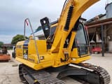 2019 Komatsu PC130 crawler excavator, rear three-quarter view