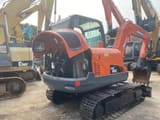2019 Doosan DX60 crawler excavator rear view with engine cover open