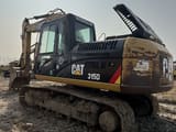 2021 Caterpillar 315D crawler excavator, rear three-quarter view