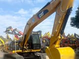 2017 Caterpillar 320D2 paletli ekskavatör, yan görünüm