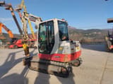 2019 Takeuchi TB250 mini excavator, rear three-quarter view